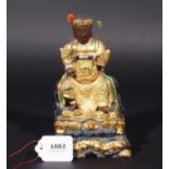 Polychrome and gilt wooden Chinese emperor, 20th century, damaged, h. 20 cm. 27.00 % buyer's