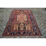 Persian carpet, dim. 234 x 129 cm. 27.00 % buyer's premium on the hammer price, VAT included