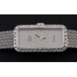 White gold ladies watch, 18 krt., brand: Emka quartz, set with appr. 40 brilliant cut diamonds, l.