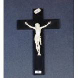 Ivory corpus on wooden cross, l. 21 cm. 27.00 % buyer's premium on the hammer price, VAT included