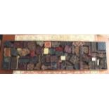Collection of textile stamps, probably India, various motifs and sizes, dim. 176 x 57 cm,