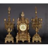 French bronze garniture: clock with two candlesticks, incl. key, one candlestick is broken (3x) 27.