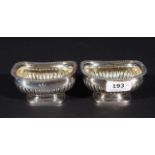 Pair of English silver salt cellars, 19th century, with slightly gilt interior, l. 9 cm, appr. 205