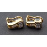 Yellow gold earrings, 14 krt., set with baguette cut diamonds, tot. appr. 0.50 crt., appr. 7 grams