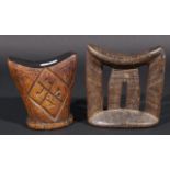 Two wooden African neck rests, h. 14 and 17 cm, Provenance: collection van Tienhoven (2x) 27.00 %
