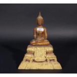 Thai wooden Buddha on Throne, early 20th century, partly gilt, h. 31 cm. 27.00 % buyer's premium on