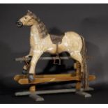 Antique rocking horse, early 20th century, dim. 68 x 67 cm, traces of age and old restorations 27.