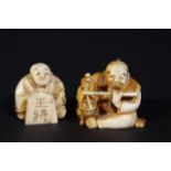 Ivory netsuke, Man with flute, signed, l. 4,5 cm + Ivory netsuke, Man with paper, signed, h. 3,5