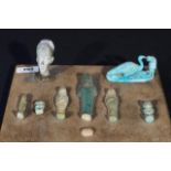 Egyptian archeological items: 6 ushabti's (one damaged) + faience heron with lion + Stone Achnaton