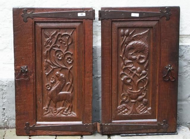 Two carved oak door panels, 18th century, dim. 62 x 37 cm (2x) 27.00 % buyer's premium on the