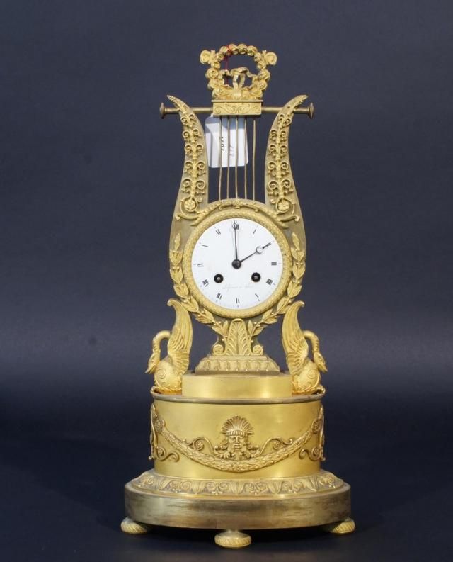 Firegilt Charles X lyra shaped tableclock, dial signed 'Lepine à Paris', 19th century, back