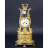 Firegilt Charles X lyra shaped tableclock, dial signed 'Lepine à Paris', 19th century, back