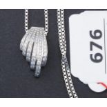 White gold necklace, 14 krt., with white gold pendant in the shape of a hand, set with brilliant