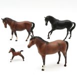 Lot of 4 Porcelain Beswick and Royal Doulton Horses