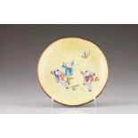 A saucer Polychrome enamel on yellow metal depicting three childs playing Marked at the base China,