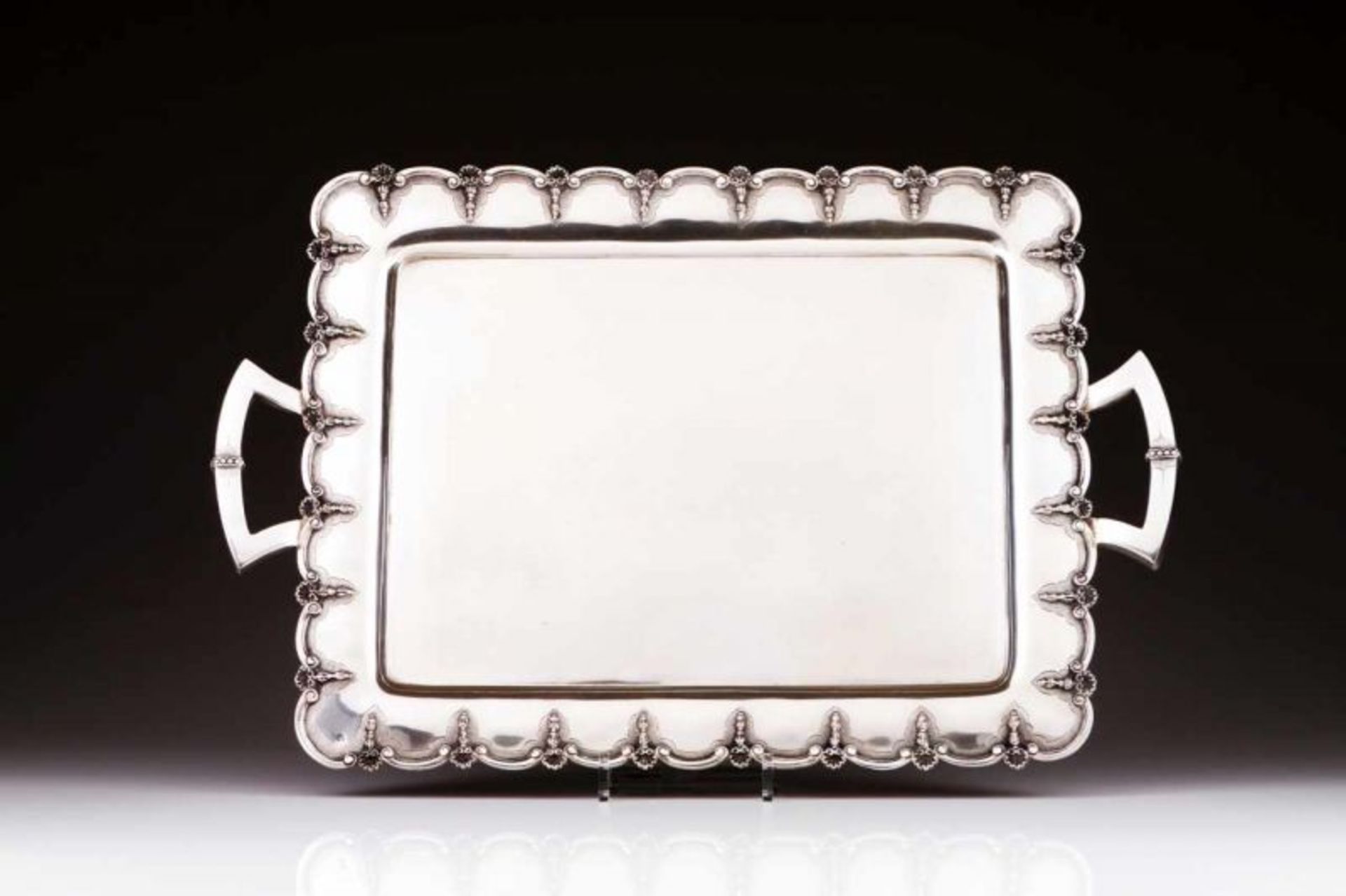 A tray Portuguese silver Scalloped tab decorated with volutes, shells and geometric handles Assay