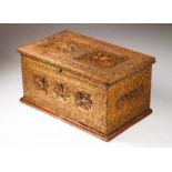 A chest Carved and gilt wood representing floral motifs, gods and dragons Red lacquered interior