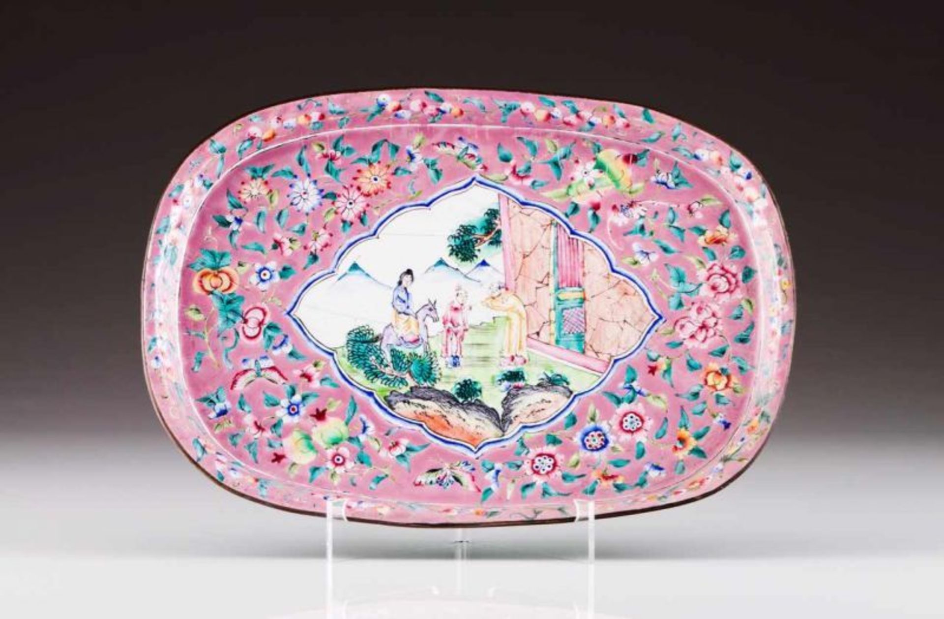 A dish Polychrome enamel on yellow metal Decorated with floral pattern on pink ground, depicting