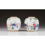 A pair of baluster vases Chinese porcelain Polychrome decoration depicting quotidian scenes with