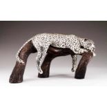 A sculpture Silvered copper Representing a panther on a tree trunk Mexican, 20th century (small