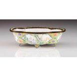 A bowl Polychrome enamel on yellow metal Fluted body Decorated with floral motifs on yellow ground,