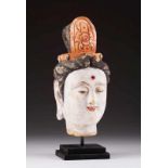 A Bodhisattva head Polychrome terracotta with white, ochre and brown decoration China, possibly