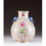 A vase Chinese porcelain Famille Rose decoration with flowers Elephant head shaped handles 20th