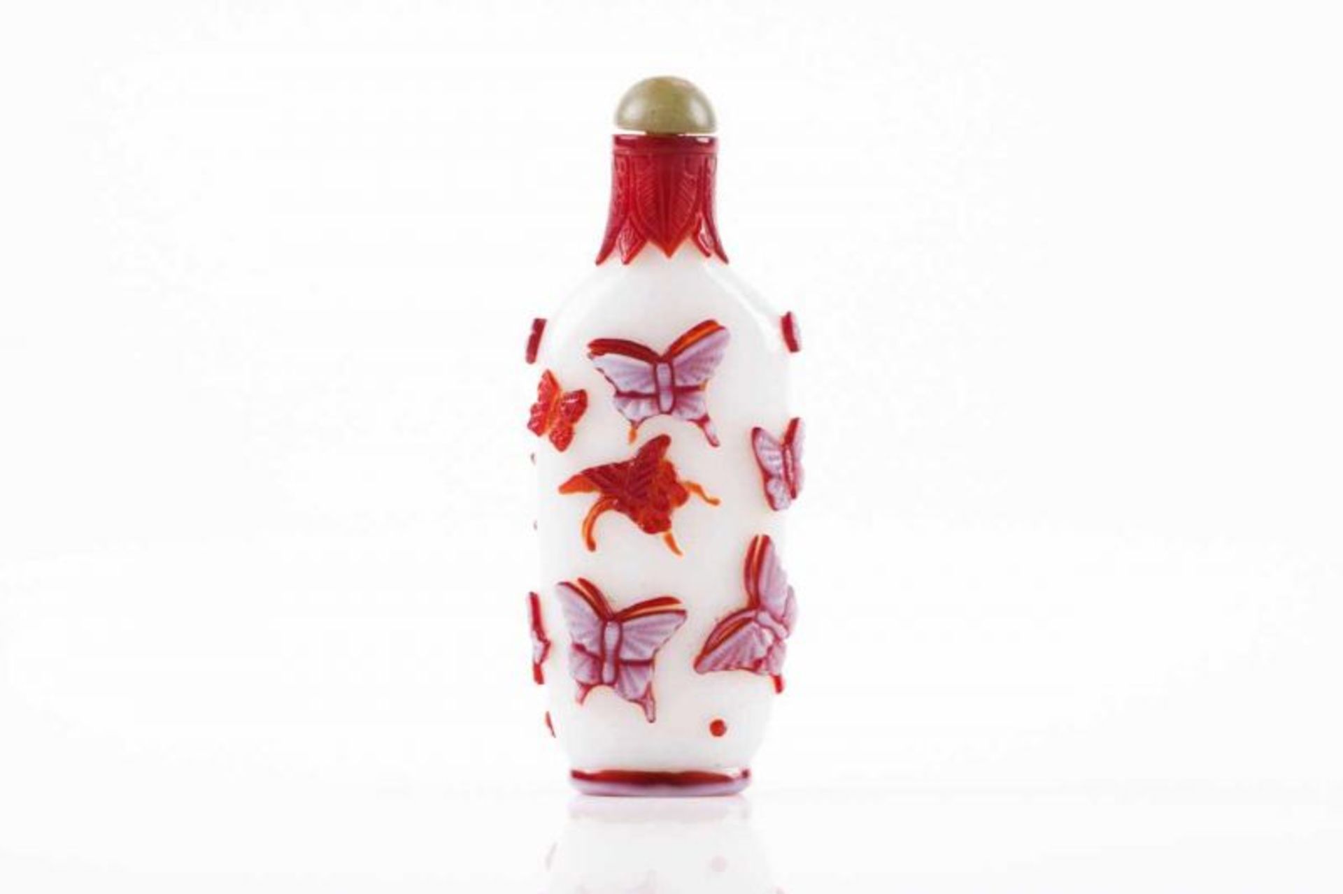 Snuff-bottle Two-toned glass Engraved decoration on three layers of ruby red and opaque white