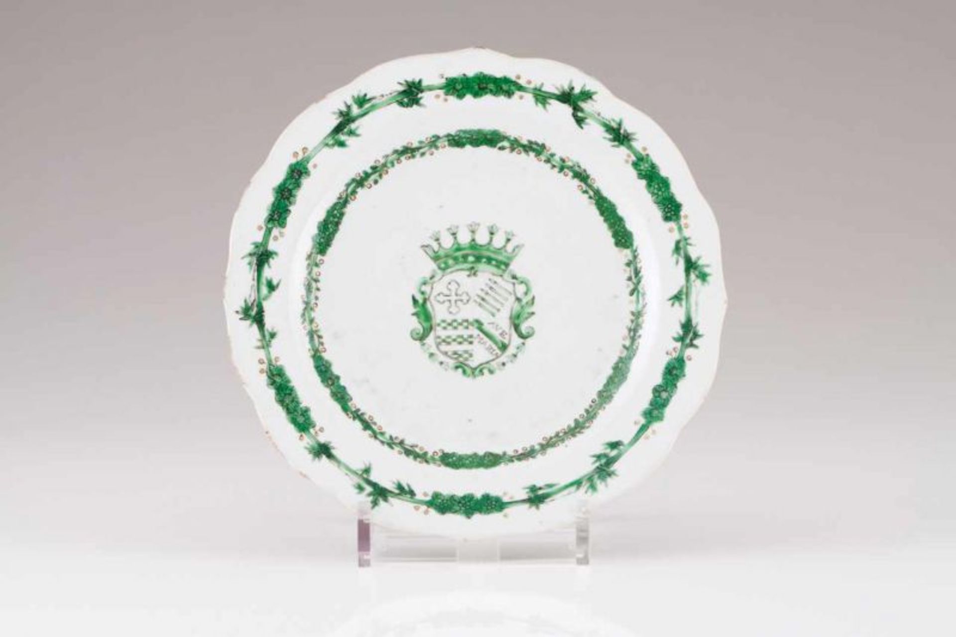 A scalloped plate Chinese export porcelain Gilt and green decoration depicting coat-of-arms of João