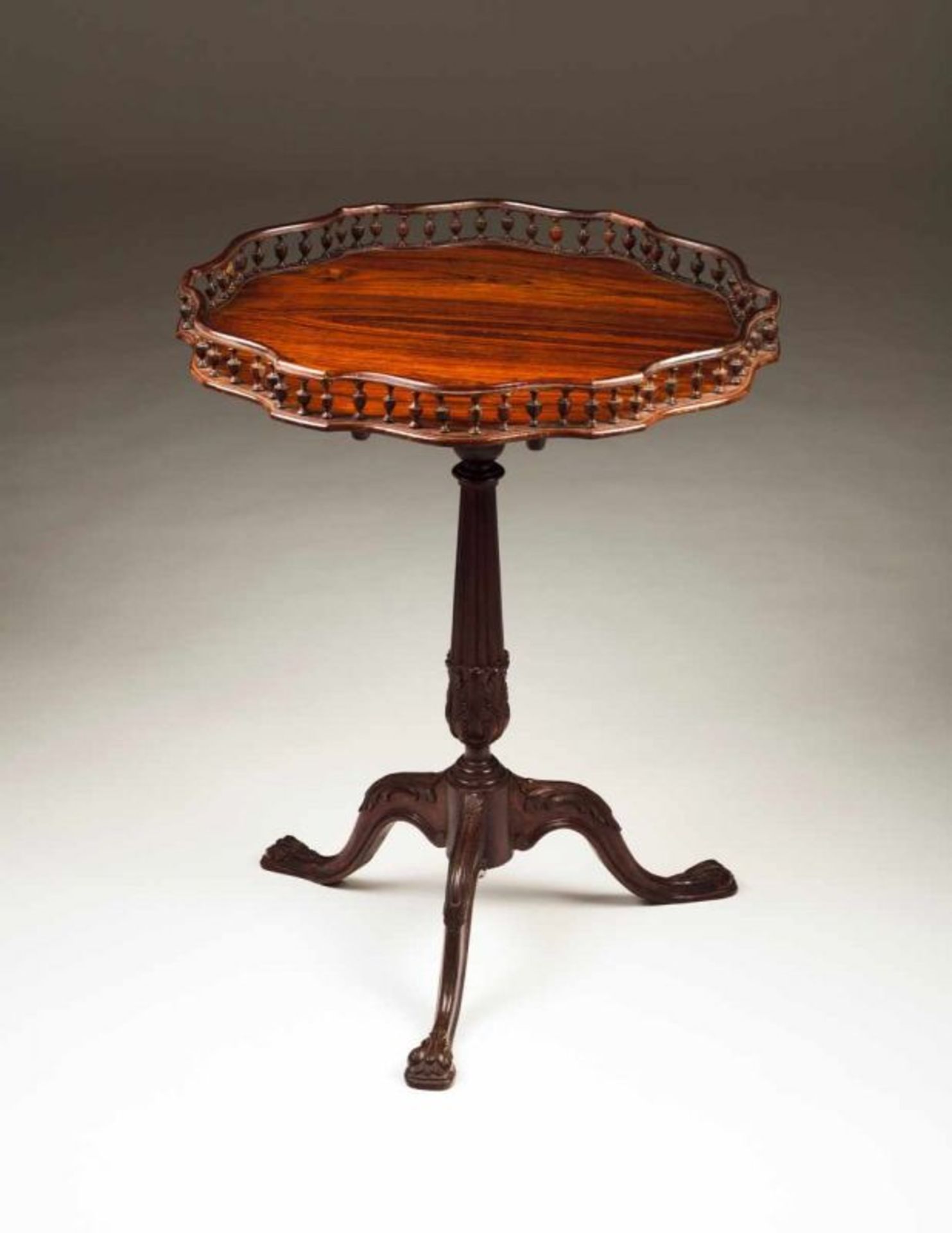 A D. José style tripod table Rosewood Gallery tilt-top, on fluted column carved with floral motifs