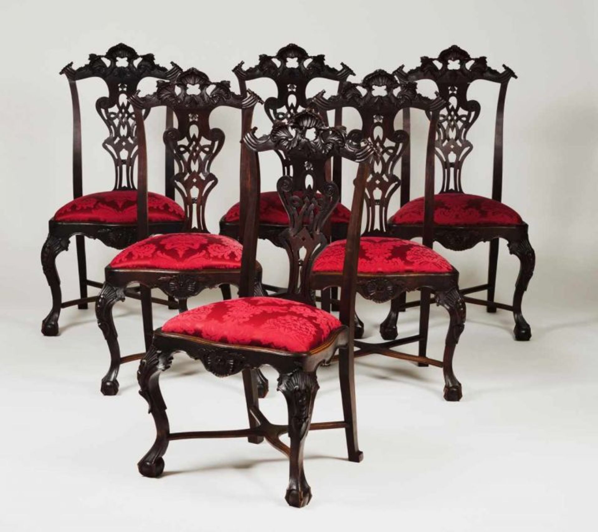 A set of six D. José (1750-1777) chairs Ebonized walnut Pierced backs and scalloped carved aprons