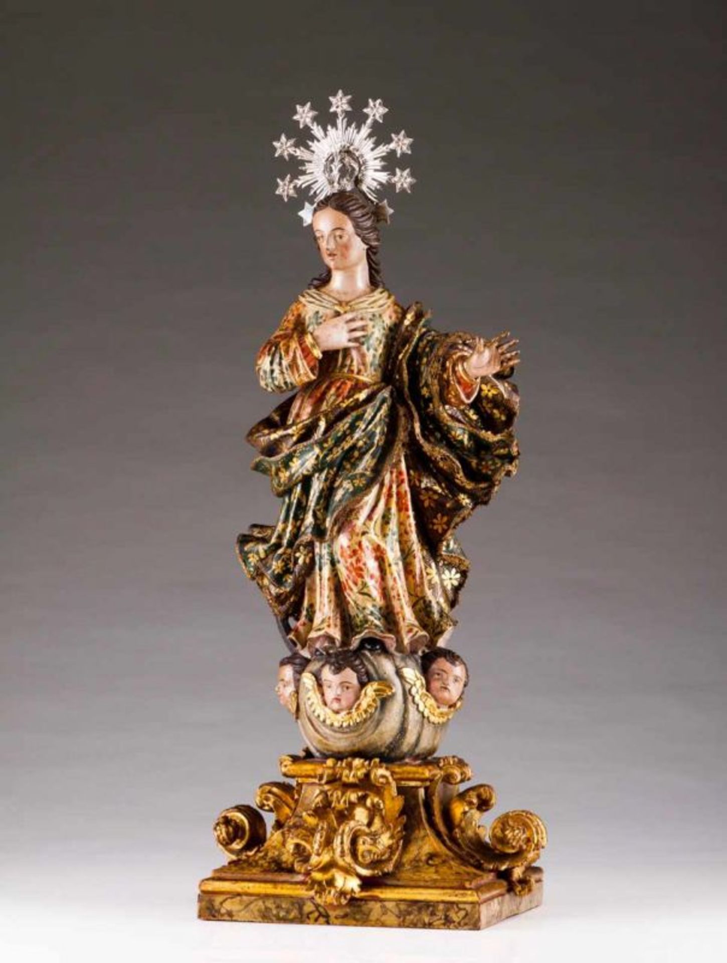 Our Lady Carved, painted and gilt wood sculpture Richely decorated clothes with floral pattern and