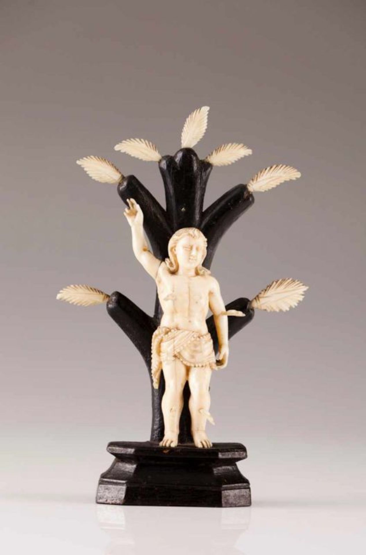 Saint Sebastian Ivory Indo-Portuguese sculpture Ebonized wood trunk and base 18th century Height: