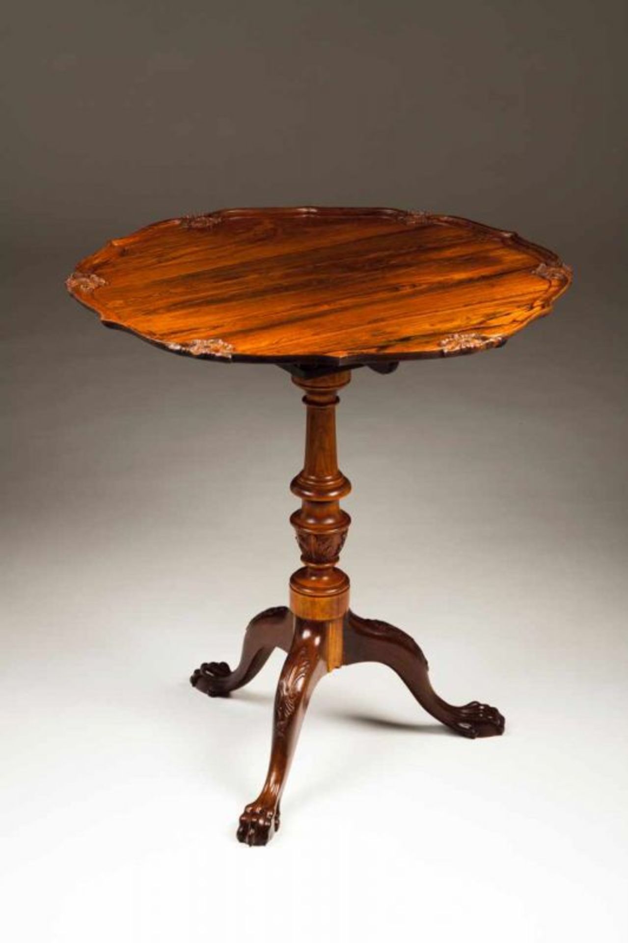 A D. José style tripod table Rosewood and other woods Scalloped tilt top with carved decoration
