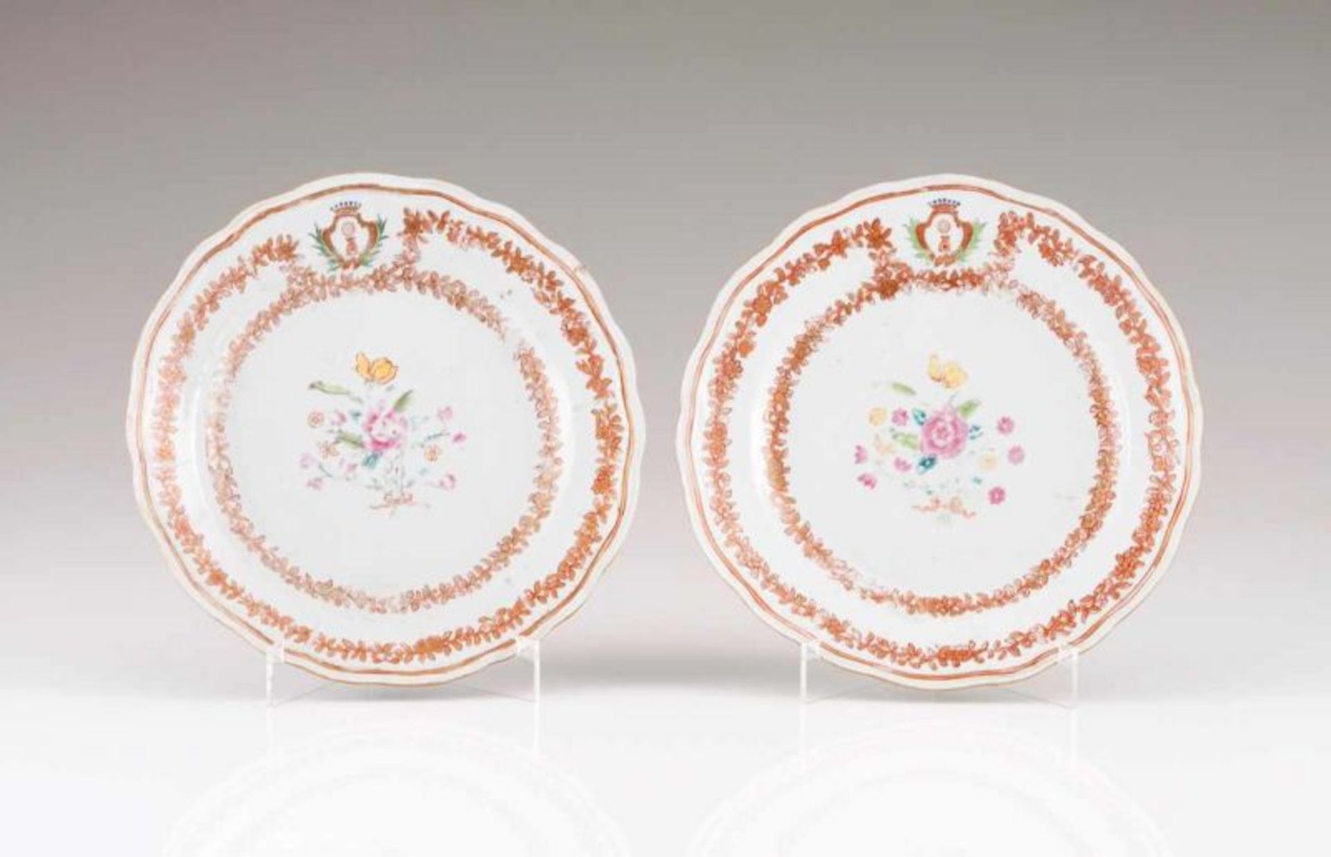 A pair of scalloped soup plates Chinese export porcelain Polychrome and gilt decoration depicting