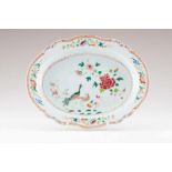 A scalloped dish Chinese export porcelain Polychrome Famille Rose decoration depicting garden view