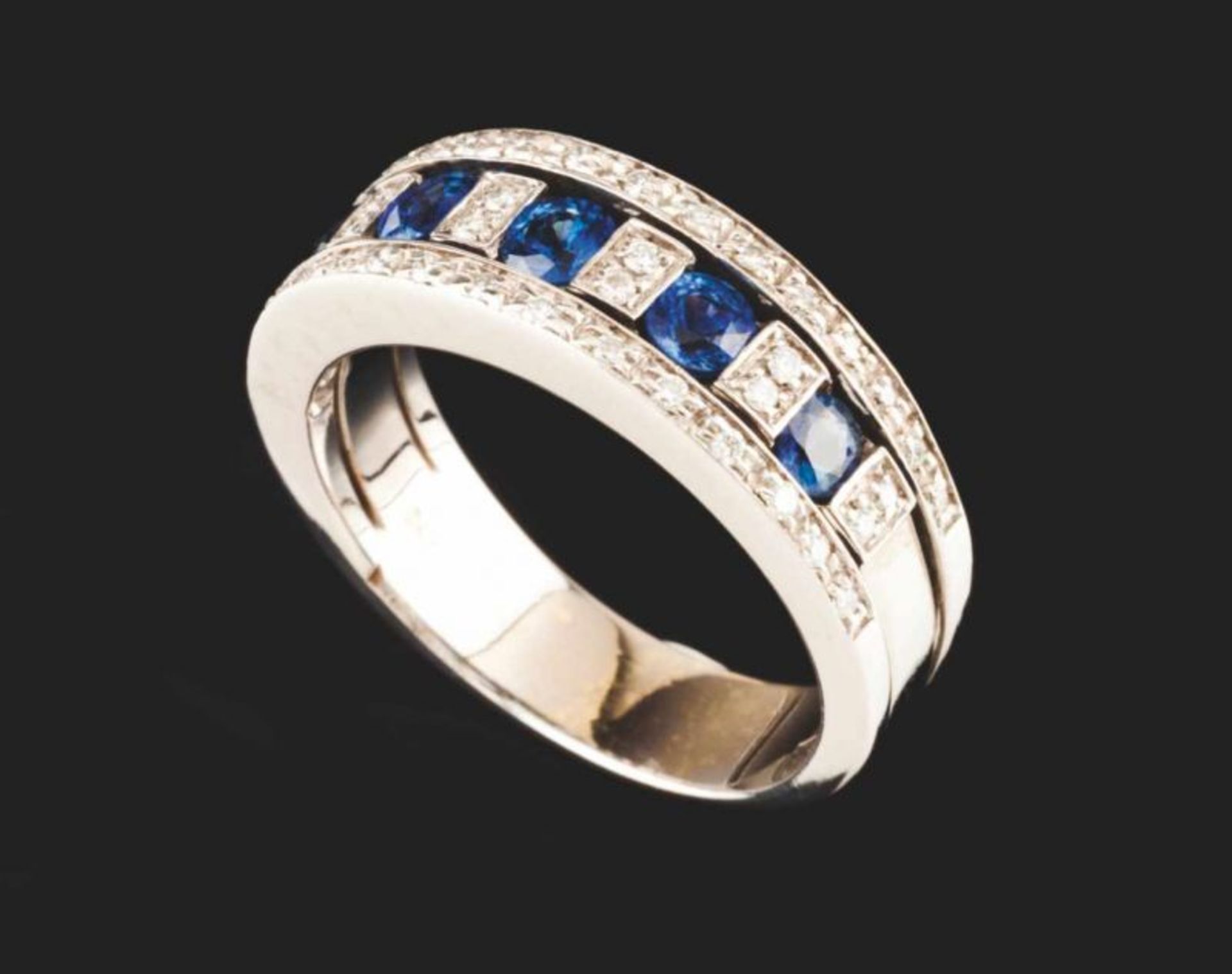 A ring, DAMIANI 18kt white gold set with brilliant cut diamonds and five round cut sapphires Marked