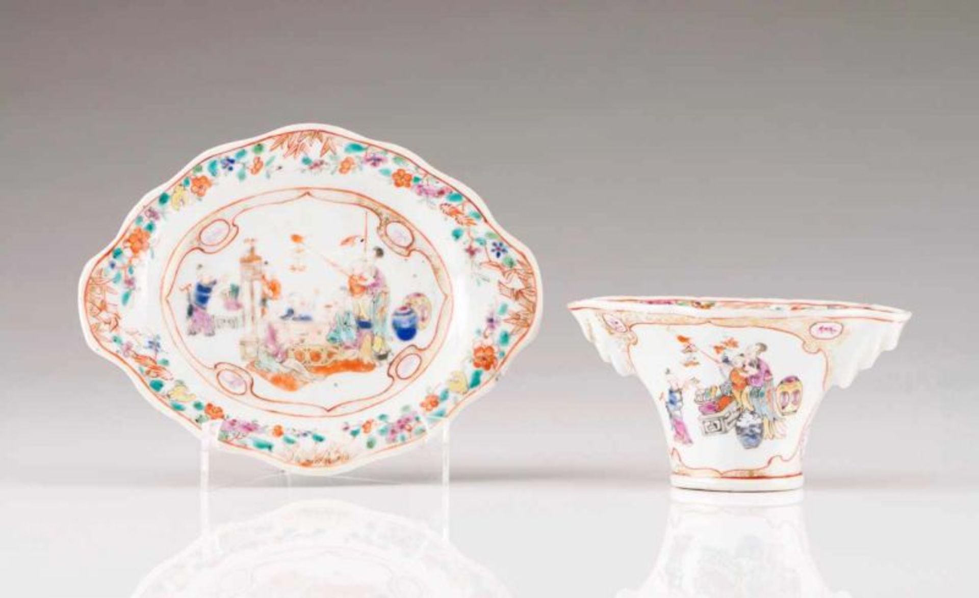 A libation cup with stand Chinese export porcelain Polychrome and gilt Famille Rose decoration