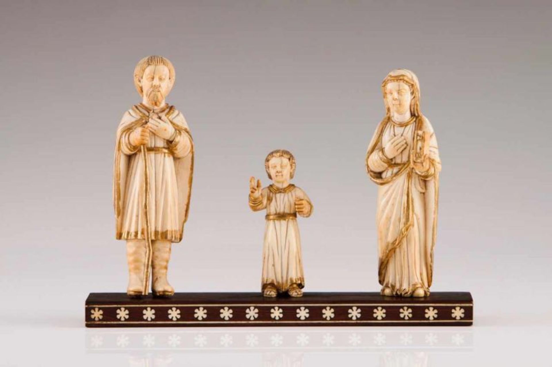 An Indo-Portuguese Holy Family Partly gilt ivory group sculpture Wood base with ivory inlaid