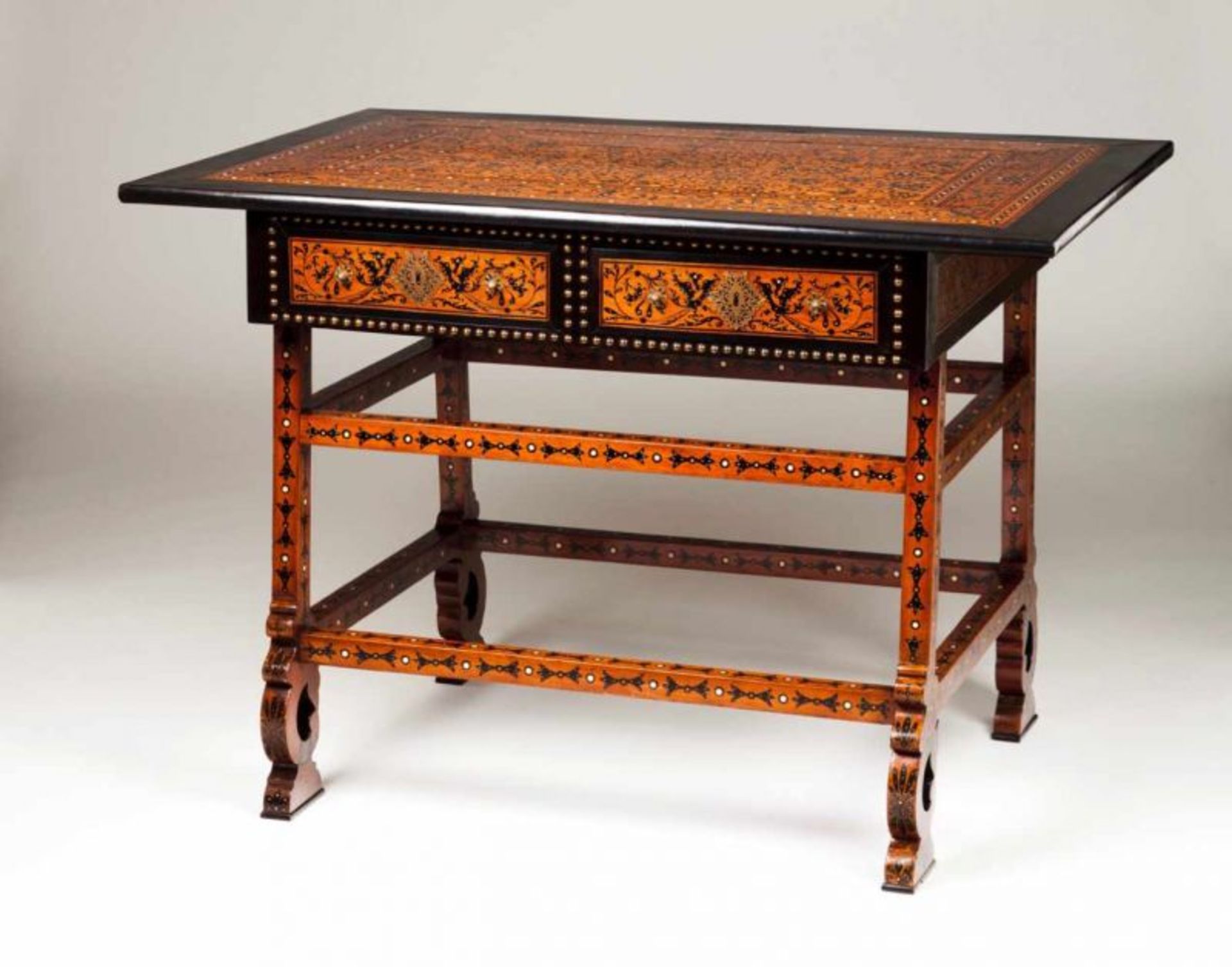 An Indo-Portuguese centre table Teak, sissoo and ebony inlaid decoration Top, rails and drawers