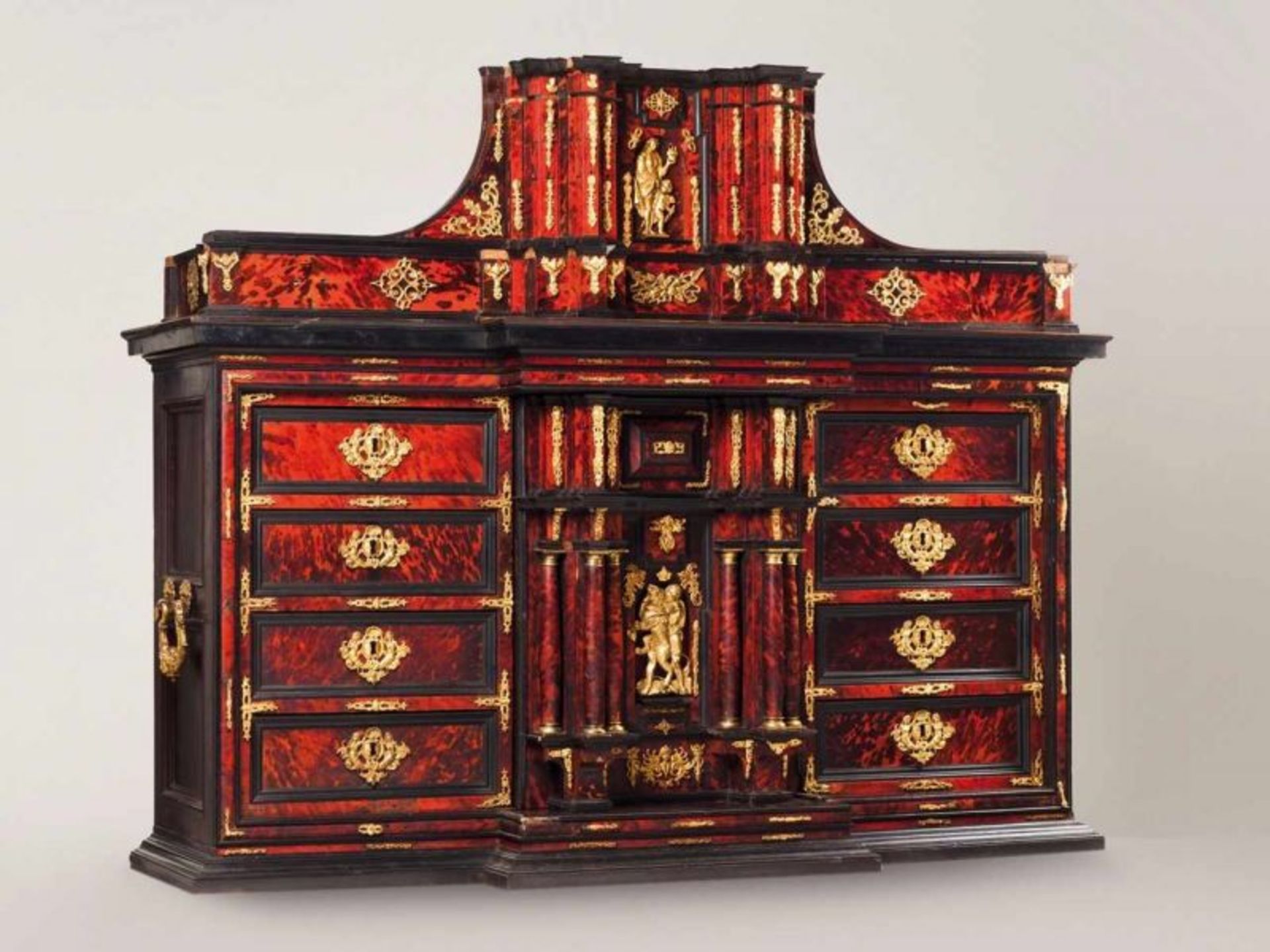 A Mannerist cabinet Tortoiseshell veneered ebony with ivory friezes Gilt bronze mounts representing