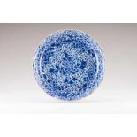 A charger Chinese porcelain Blue decoration with flowers Kangxi Period (1662-1722) (small chips)