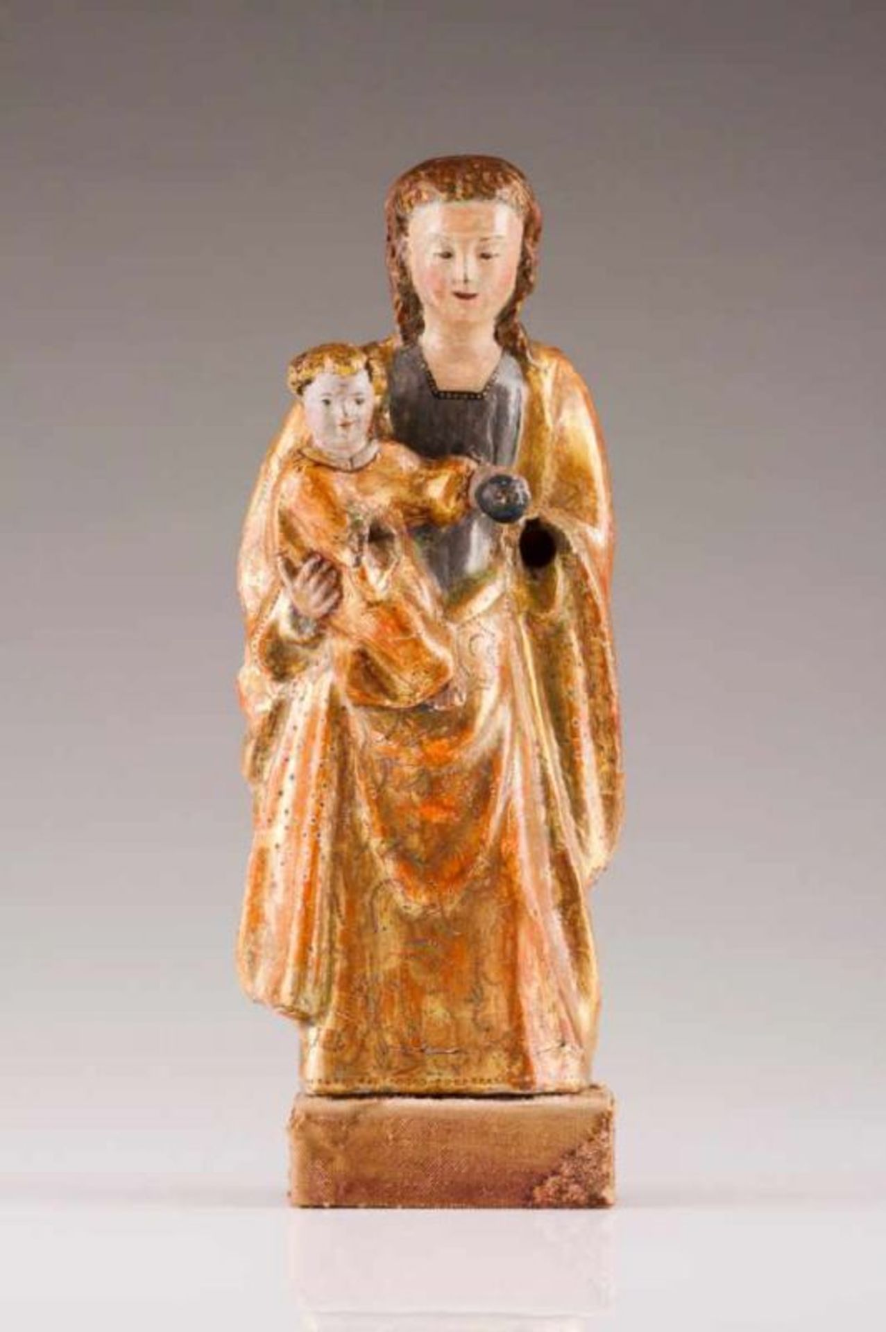 Our Lady with the Child Polychrome and gilt wood sculpture Flemish, 16th century Base of later date