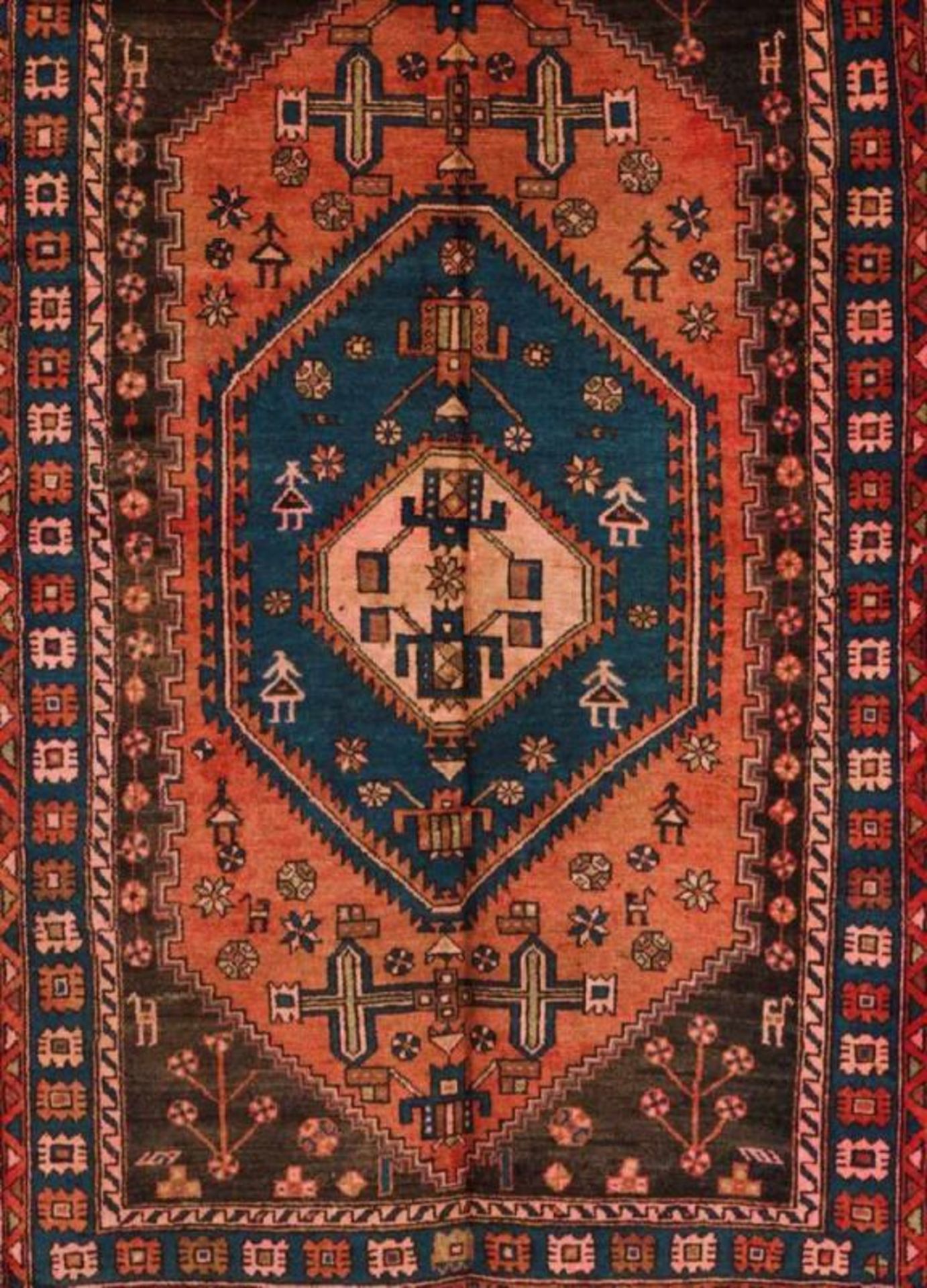 A Zamjen carpet, Iran Cotton and wool Geometric decoration in blue, salmon-pink and green 200x130