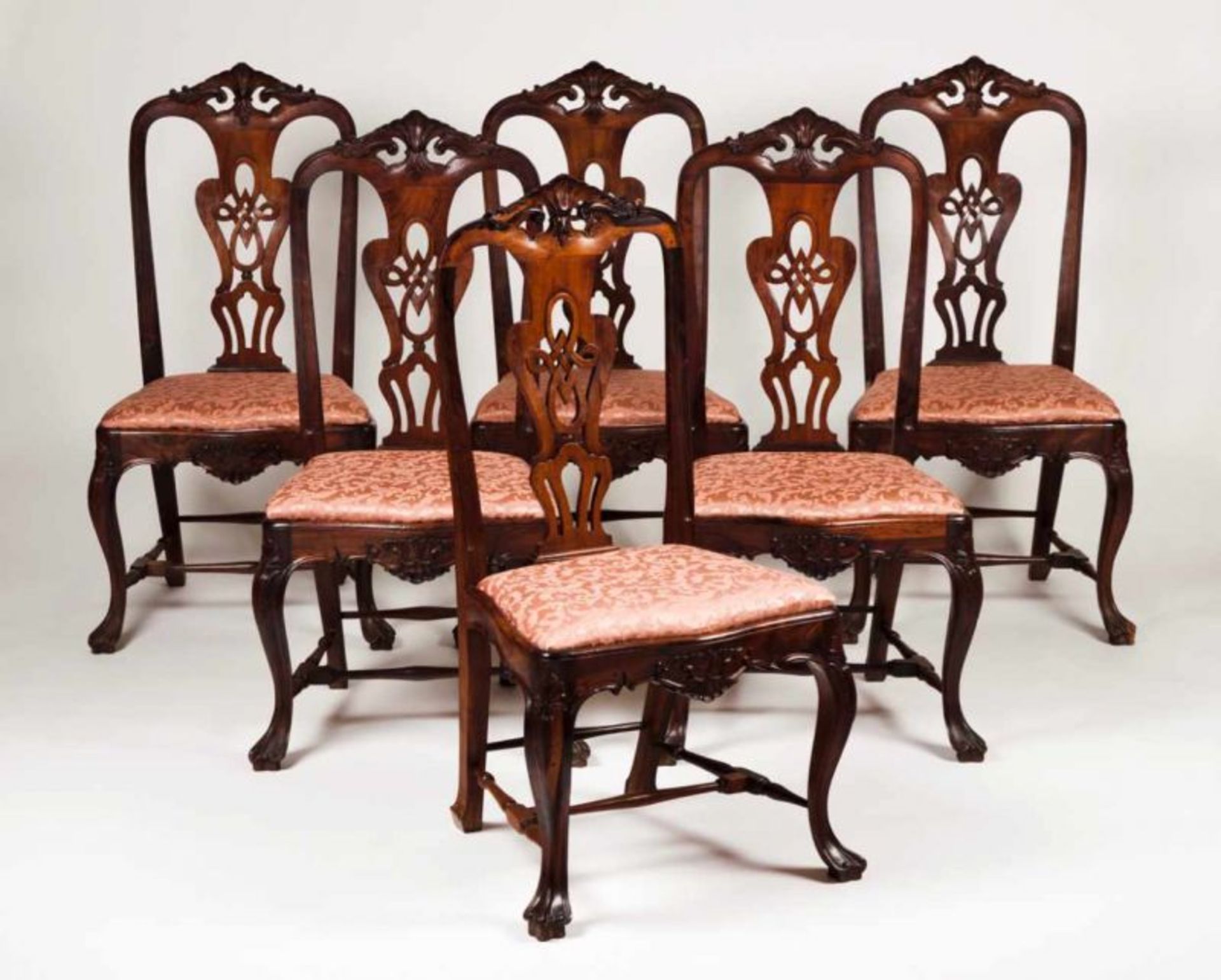 A set of six D. José style chairs Rosewood Pierced, scalloped and carved backs with floral motifs