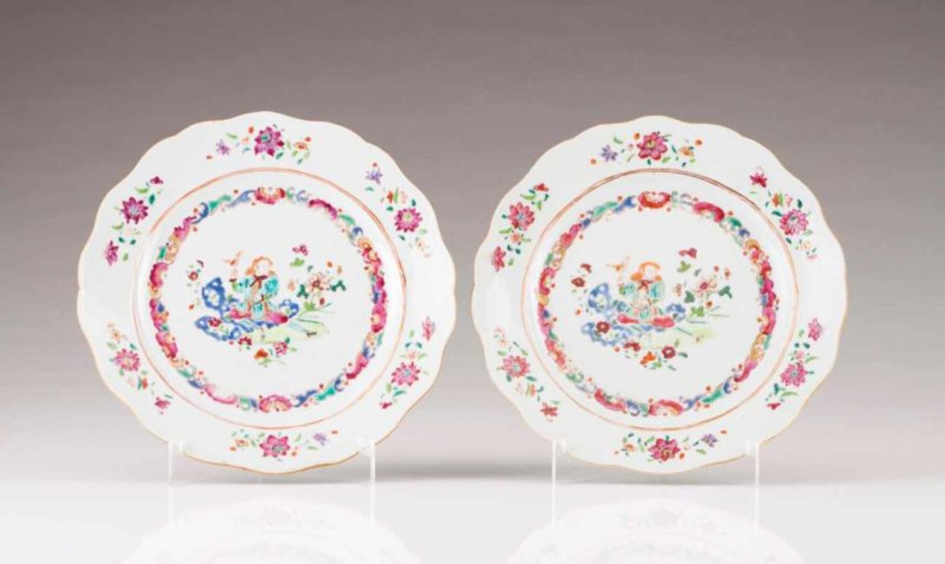 A rare pair of scalloped plates Chinese export porcelain Polychrome and gilt decoration depicting