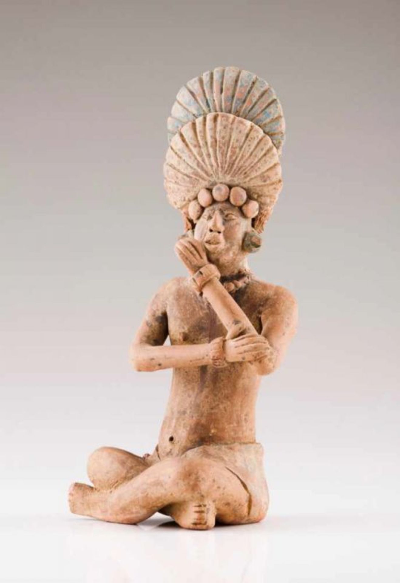 A figure Terracotta sculpture with traces of polychromy Mexico, Mayan culture, 5th to 9th century (