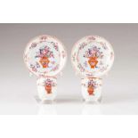 A pair of cups and saucers Chinese export porcelain Polychrome and gilt Famille Rose decoration