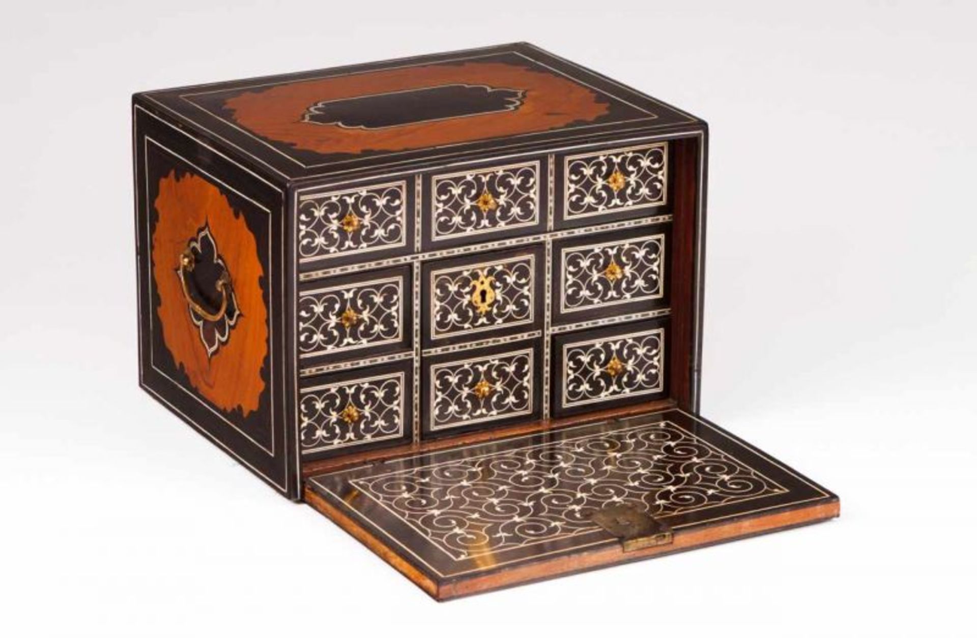 A Mogul cabinet Teak partly veneered in ebony Ivory inlaid decoration Interior with six drawer