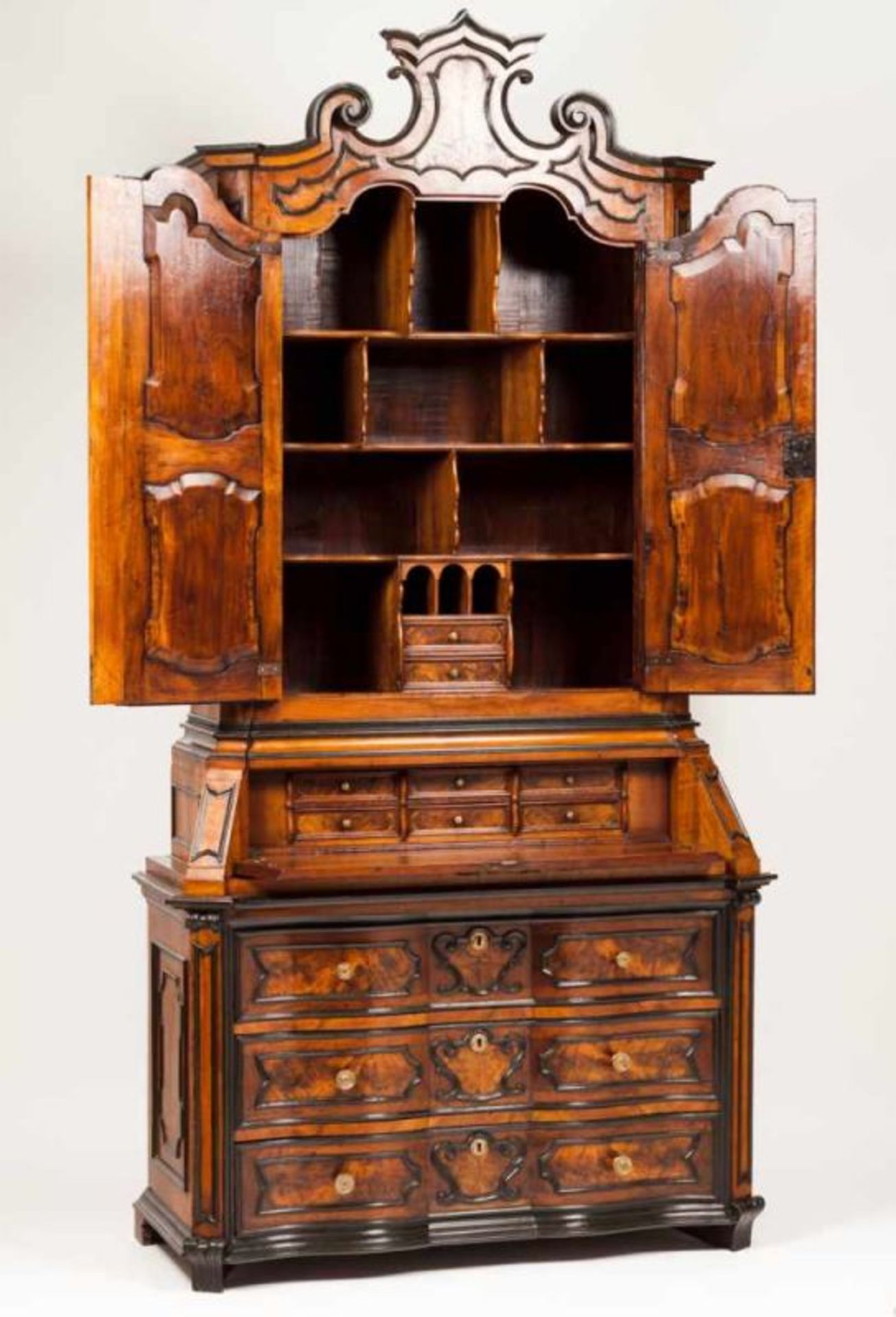 A bookcase-bureau Walnut and burr-walnut with ebonized wood friezes Interior with drawers and